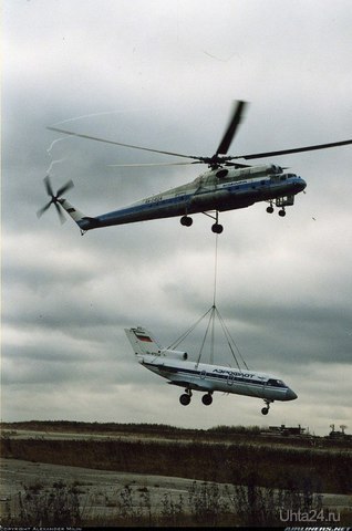 Тяжелый вертолёт Ми-10К Ухтинского авиапредприятия, поднимает в воздух на внешней подвеске самолёт Як-40 / RA-87234 для доставки его в Усинск.

В последствии Як-40 будет установлен в детском парке аттракционов "Радуга" в Усинске, открытого в сентябре 2002 года, при непосредственном участии ООО "Лукойл-Коми". Самолет был представлен в цветах "Лукойла". Используется, как тир.

Фото: https://vk.com/avkomi История Ухта